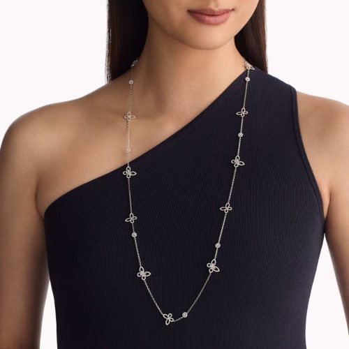 white gold chain, elegant butterfly design, adjustable length.